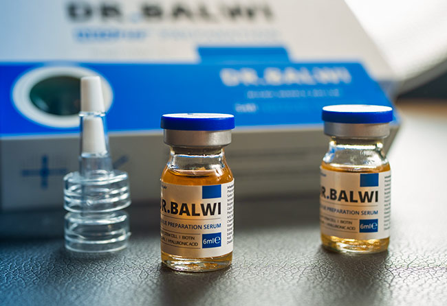 Flacon de sérum Neo FUE – Préparation greffe de cheveux Elithair